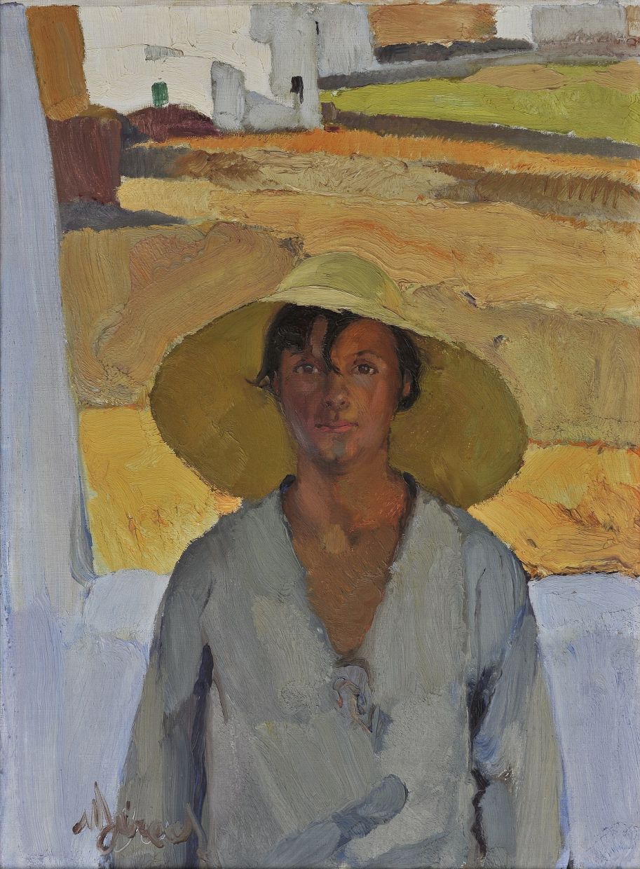 A woman wearing a sunhat